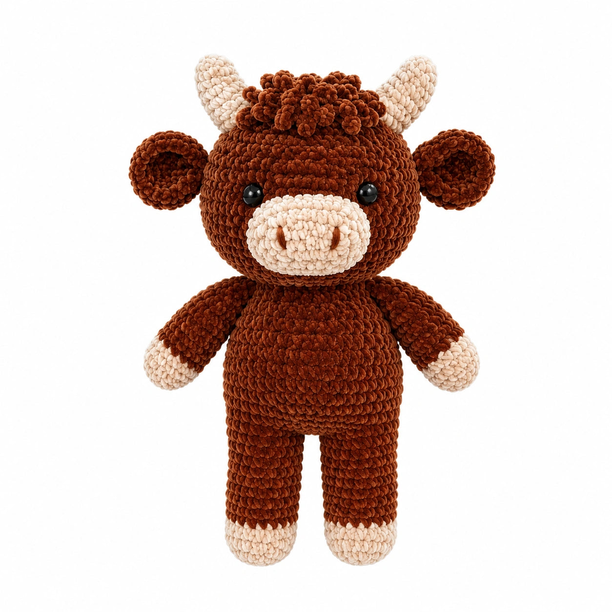 Handmade crochet Highland cow plush toy in soft brown velvet yarn on white background